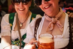 Kimberly Charles and Haley Billue attending Brick Store Pub Oktoberfest in Decatur, GA